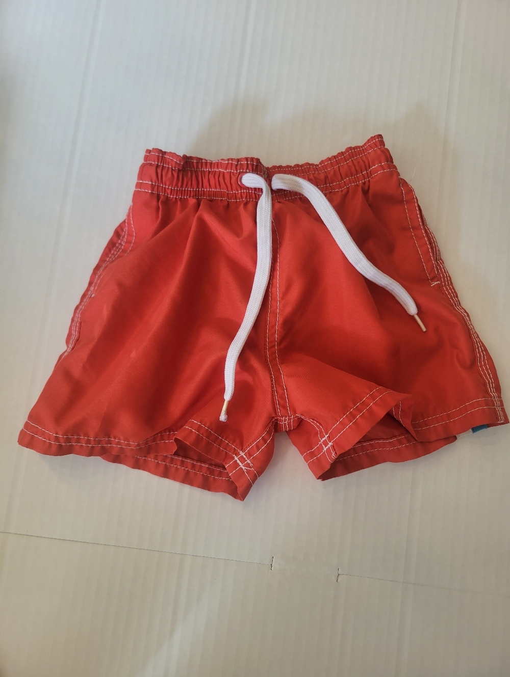 Kids Red Swim Shorts with White Drawstring